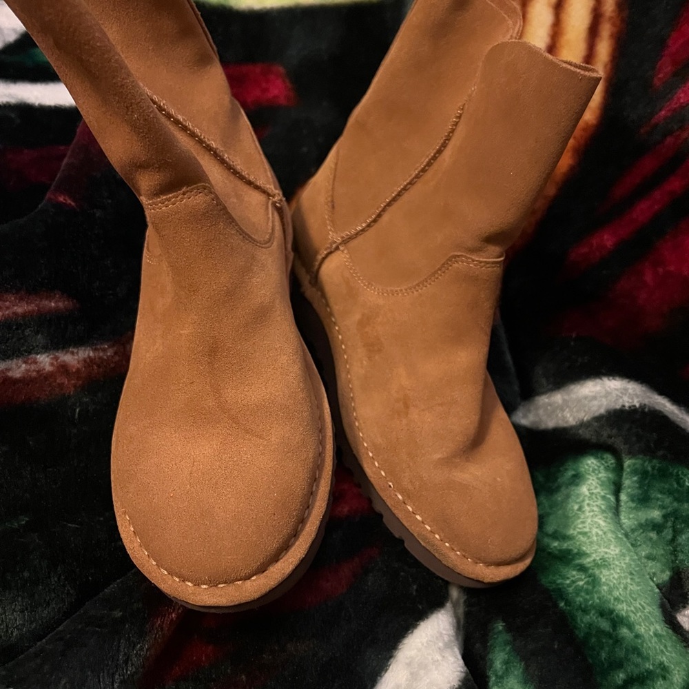 New UGG boots never worn, but do have some scuffs/scratches